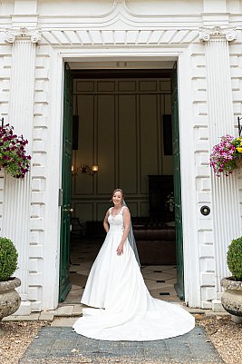 gosfield-hall-real-wedding-bride-in-doorway-essex.jpg