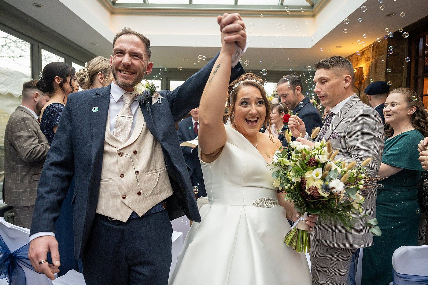 Full-day documentary wedding photography with luxury album included