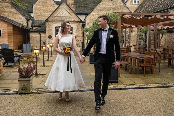 Bride and groom portraits in the gardens at Haycock Manor Hotel