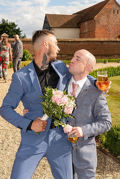 Candid moments during a Leez Priory wedding captured documentary style