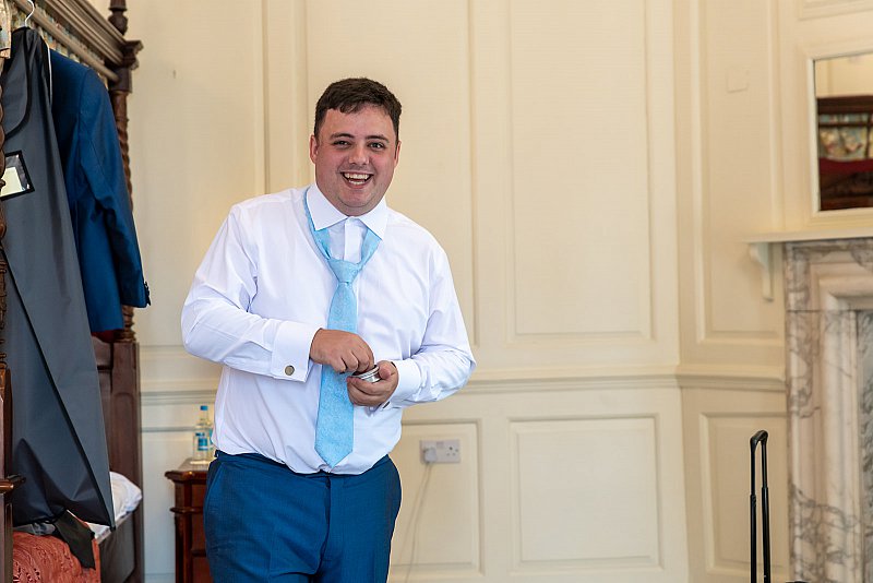 Gosfield-hall-Groom-relaxing.jpg